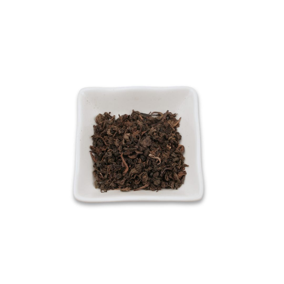 Premium Watercome Iron Guan Yin oolong tea leaves with a rich roasted aroma and smooth floral finish, ideal for bubble tea and specialty tea beverages