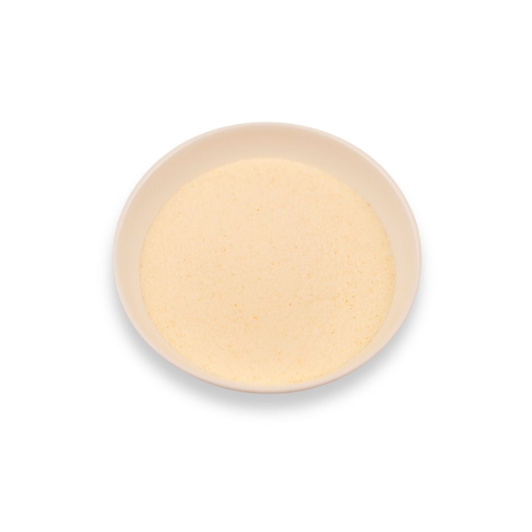 Fine almond powder in a bowl, light beige color with smooth texture, ideal for bubble tea, milk tea, and dessert applications