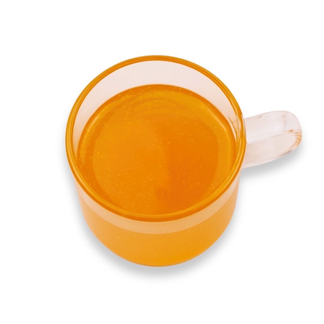 Watercome Kumquat Syrup sample showing golden citrus-colored syrup