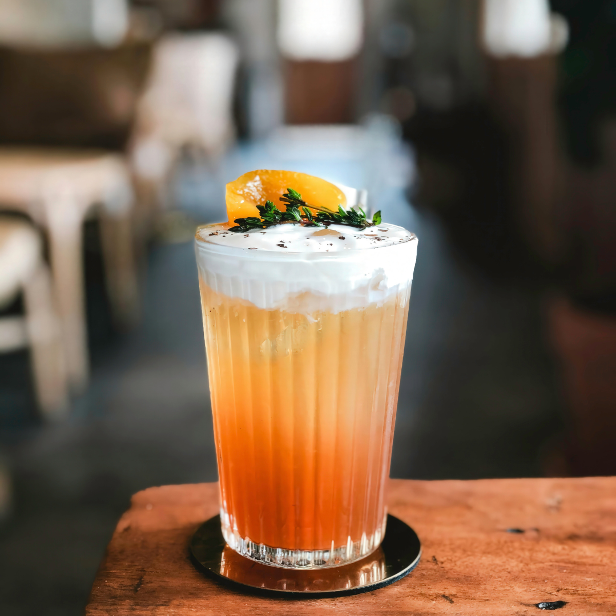 Premium white peach tea and cocktail style drink prepared with white peach syrup offering fragrant peach aroma and smooth fruit flavor