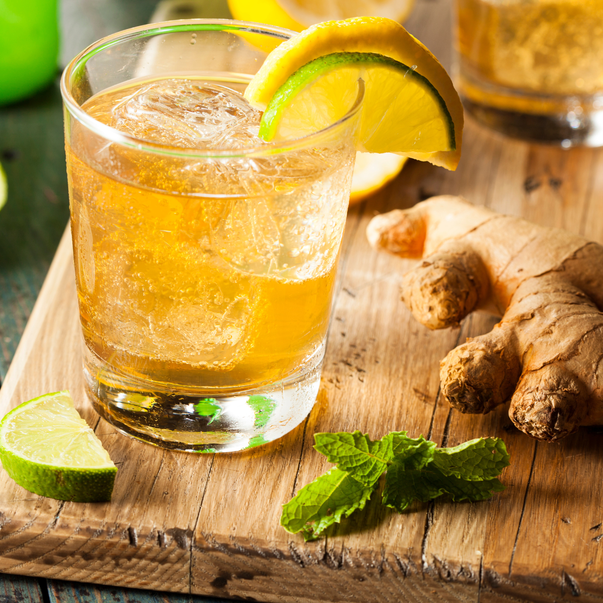 ginger soda drink with lime and fresh ginger for refreshing beverage