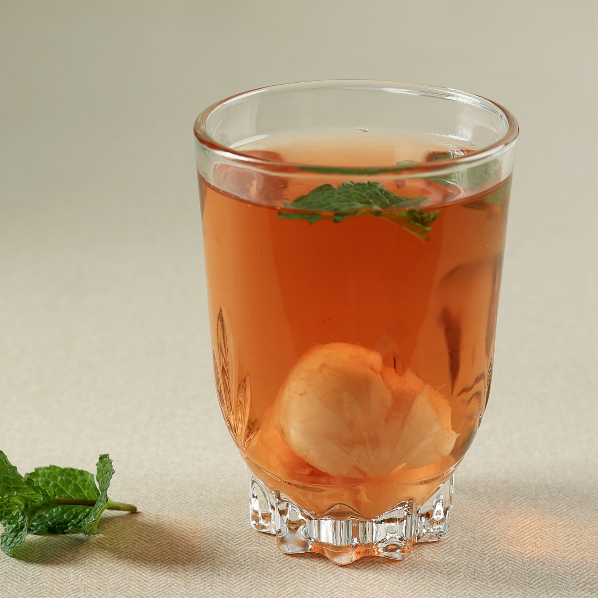 Lychee fruit tea featuring fragrant floral aroma and juicy tropical lychee flavor