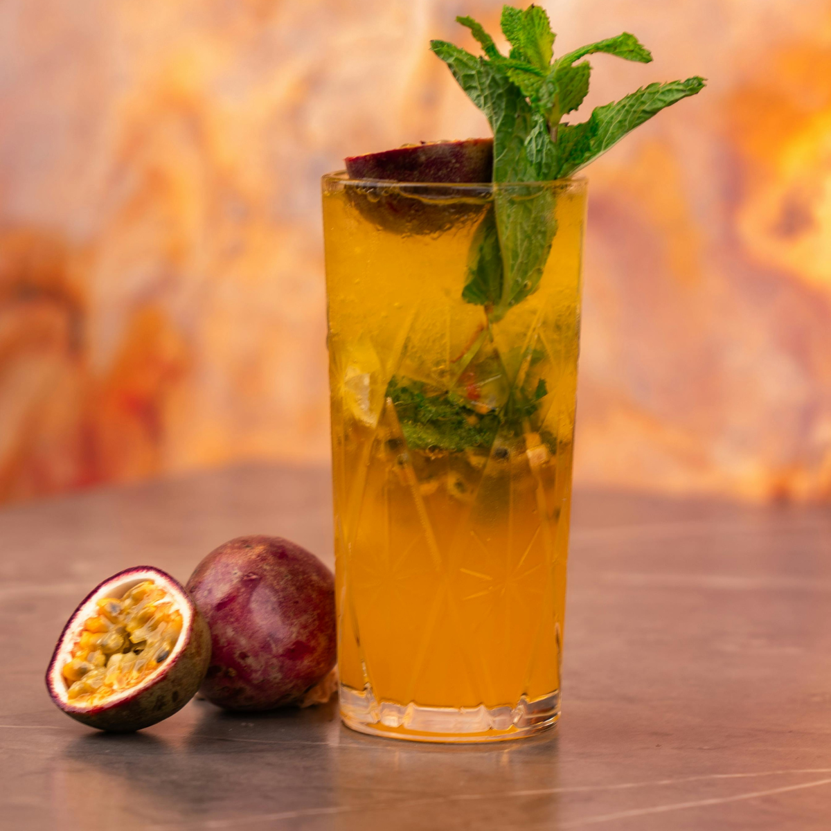Passion fruit cocktail made with passion fruit syrup featuring vibrant tropical flavor and refreshing citrus notes