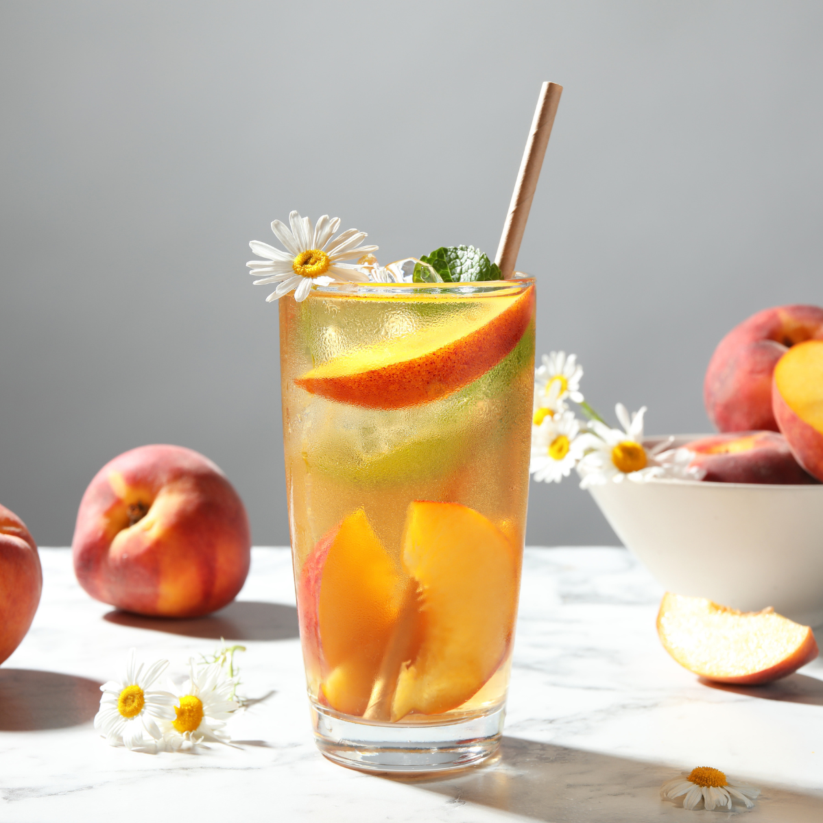 Refreshing peach iced tea with fresh peach slices for fruit tea and specialty drink menus