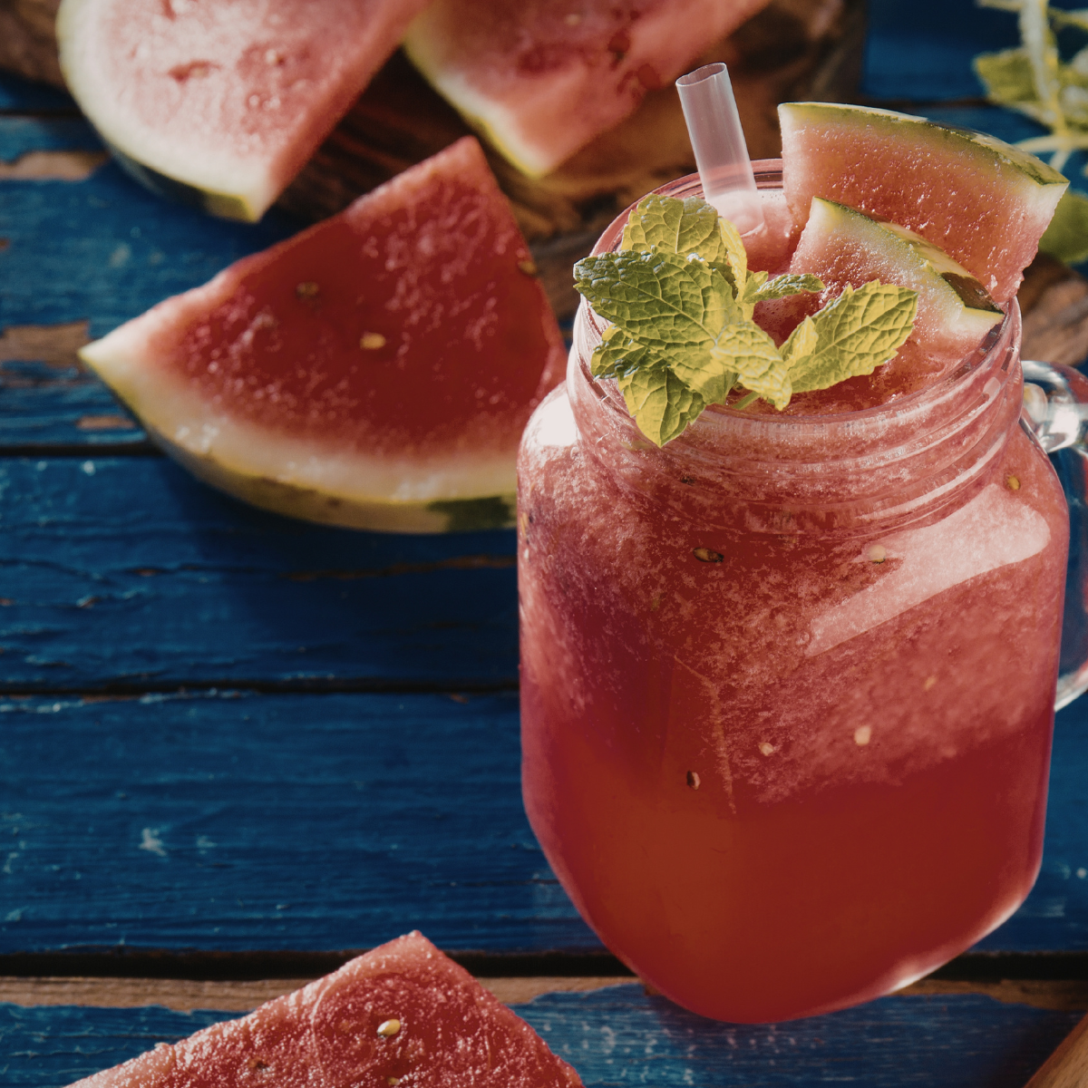 watermelon iced drink with fresh watermelon slices and mint